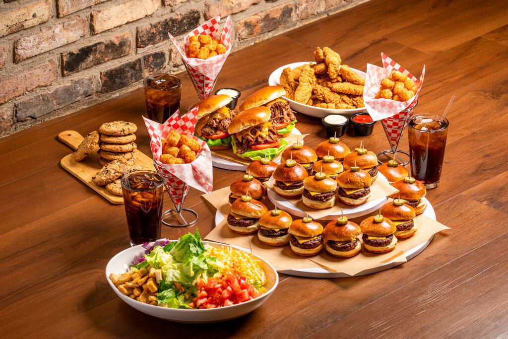 Mini sliders and salad spread for party at Cactus Bowl